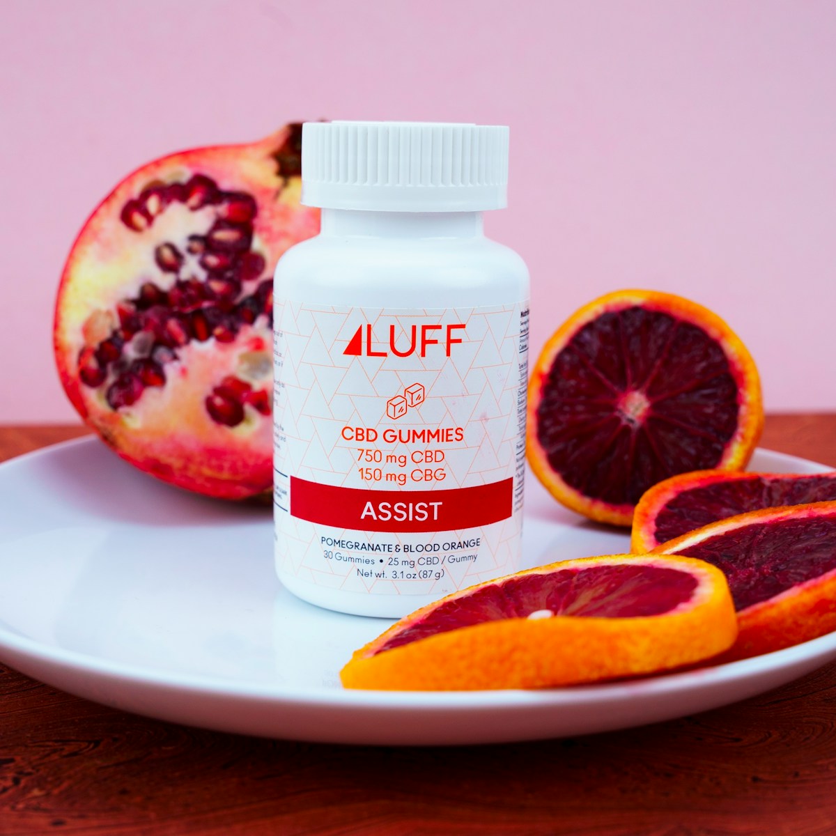 orange fruit on white ceramic plate